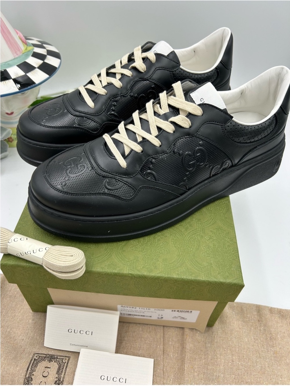 Gucci Men’s GG Black Leather Embossed Low-Top Sneakers. Size 11.5